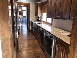 Walk-through galley-style service and utility area