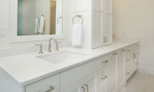 Bathroom with double-sinks and lovely cabinets