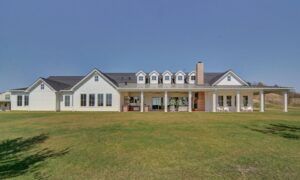 Exterior of new custom home with large patio
