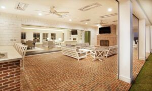 Large outdoor patio, fireplace, and ceiling heaters